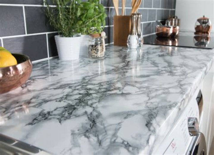 Home Depot Shopper Shares $100 Hack to Upgrade Your Kitchen to "Marble"