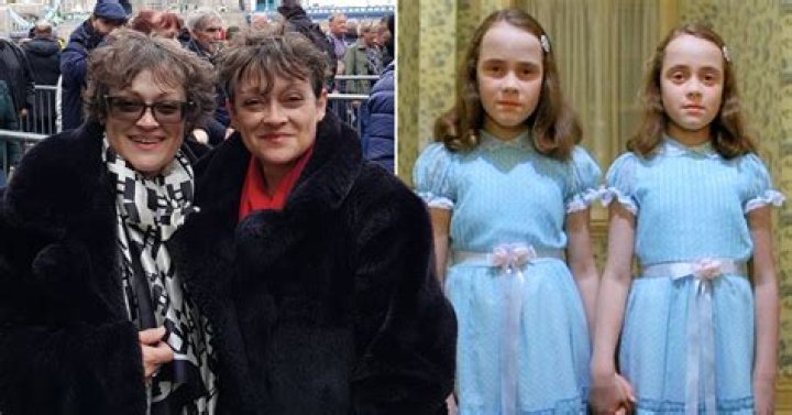 See the Twins From "The Shining," Now 54, in the Queen's Queue